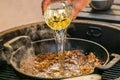 Chef prepares ingredients for bulgur on the grill