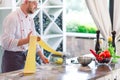 The chef prepares the paste for the visitors. Royalty Free Stock Photo