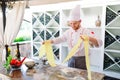 The chef prepares the paste for the visitors. Royalty Free Stock Photo