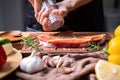 Chef prepares pork chop steak with barbecue sauce