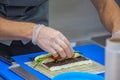 The chef prepares sushi in the restaurant Royalty Free Stock Photo
