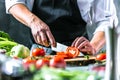 Chef prepares vegetables to cook in the restaurant kitchen Royalty Free Stock Photo