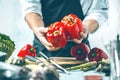 Chef prepares vegetables to cook in the restaurant kitchen Royalty Free Stock Photo