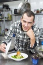 Chef preparing food in the kitchen Royalty Free Stock Photo