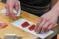 Chef preparing a fresh Tuna on a cutting board for otoro sushi Royalty Free Stock Photo