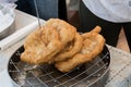 Chef preparing fried churros or donuts and pancakes during brunch buffet in the garden. Food Buffet Brunch Catering Dining Eating