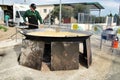 Chef preparing giant paella in Orihuela, Spain