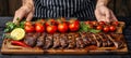 Chef preparing grilled steak in creamy butter lemon or cajun spicy sauce with herbs