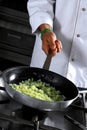 Chef preparing onion