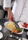 Chef preparing pasta