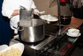 Chef preparing pasta during brunch buffet or food bloggers Royalty Free Stock Photo