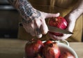 A chef preparing pomegranate food photography recipe idea