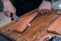 Chef preparing a salmon fish Royalty Free Stock Photo