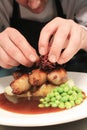 Chef preparing sausage dinner Royalty Free Stock Photo