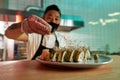 Chef preparing sushi in an Asia restaurant Royalty Free Stock Photo