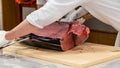 Chef preparing tuna sashimi