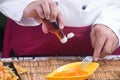 Chef putting fish sauce to egg