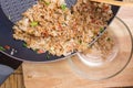 Chef putting fried rice to cup Royalty Free Stock Photo