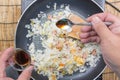 Chef putting soy sauce for cooking fried rice Royalty Free Stock Photo