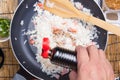 Chef putting soy sauce for cooking rice Royalty Free Stock Photo