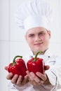 Chef with red peppers Royalty Free Stock Photo