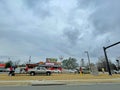 Chef Redds Extreme Bar-B-Q Restaurant and cars distant view