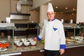 The chef of the restaurant of hotel Marvel poses in the workplace