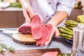 Chef cutting and cooking meat in the restaurant kitchen Royalty Free Stock Photo