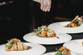 The chef at the restaurant making Spicy Shrimp Tacos with Coleslaw and Salsa Royalty Free Stock Photo