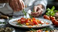 Chef Garnishing Fresh Vegetable Salad with Herbs, Culinary Art in Modern Kitchen. Healthy Eating Concept. AI Royalty Free Stock Photo