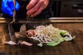 Chef`s Hands making yakisoba ,Japanese hot pan fried noodle, selected focus Royalty Free Stock Photo