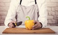 Chef`s hands. Man is ready to prepare fresh salad. Royalty Free Stock Photo