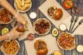 Chef's hands preparing fast food dishes, tequeÃÂ±os, assorted hamburgers, Royalty Free Stock Photo