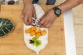 Chef's hands preparing a sushi tray with red tuna maki Royalty Free Stock Photo