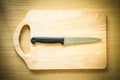 Chef`s knife on a cutting board