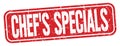 CHEF`S SPECIALS text written on red stamp sign Royalty Free Stock Photo