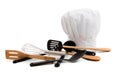 Chef's toque with various cooking utensils Royalty Free Stock Photo