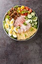 Chef salad is an American salad consisting of boiled eggs, more varieties of meat, tomatoes, cucumbers, and cheese, all placed