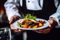 the chef serves the dish on a white plate, the modern serving of the dish