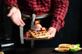 Chef serving freshly made waffle dessert Royalty Free Stock Photo