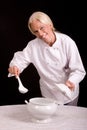 Chef serving with a ladle