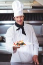 Chef showing plate of spaghetti Royalty Free Stock Photo