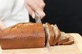 Chef Slicing Banana Bread Royalty Free Stock Photo