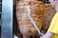 Chef slicing Gyros Greek fast food