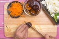 Chef slicing mushroom for cooking Royalty Free Stock Photo