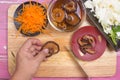 Chef slicing mushroom for cooking Royalty Free Stock Photo