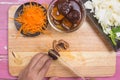 Chef slicing mushroom for cooking Royalty Free Stock Photo