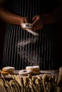 Chef spreading flour on bakery prepare for baking. Cook showing