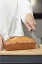 Chef Starting To Slice Banana Bread Royalty Free Stock Photo