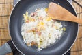 Chef stir fried rice on pan